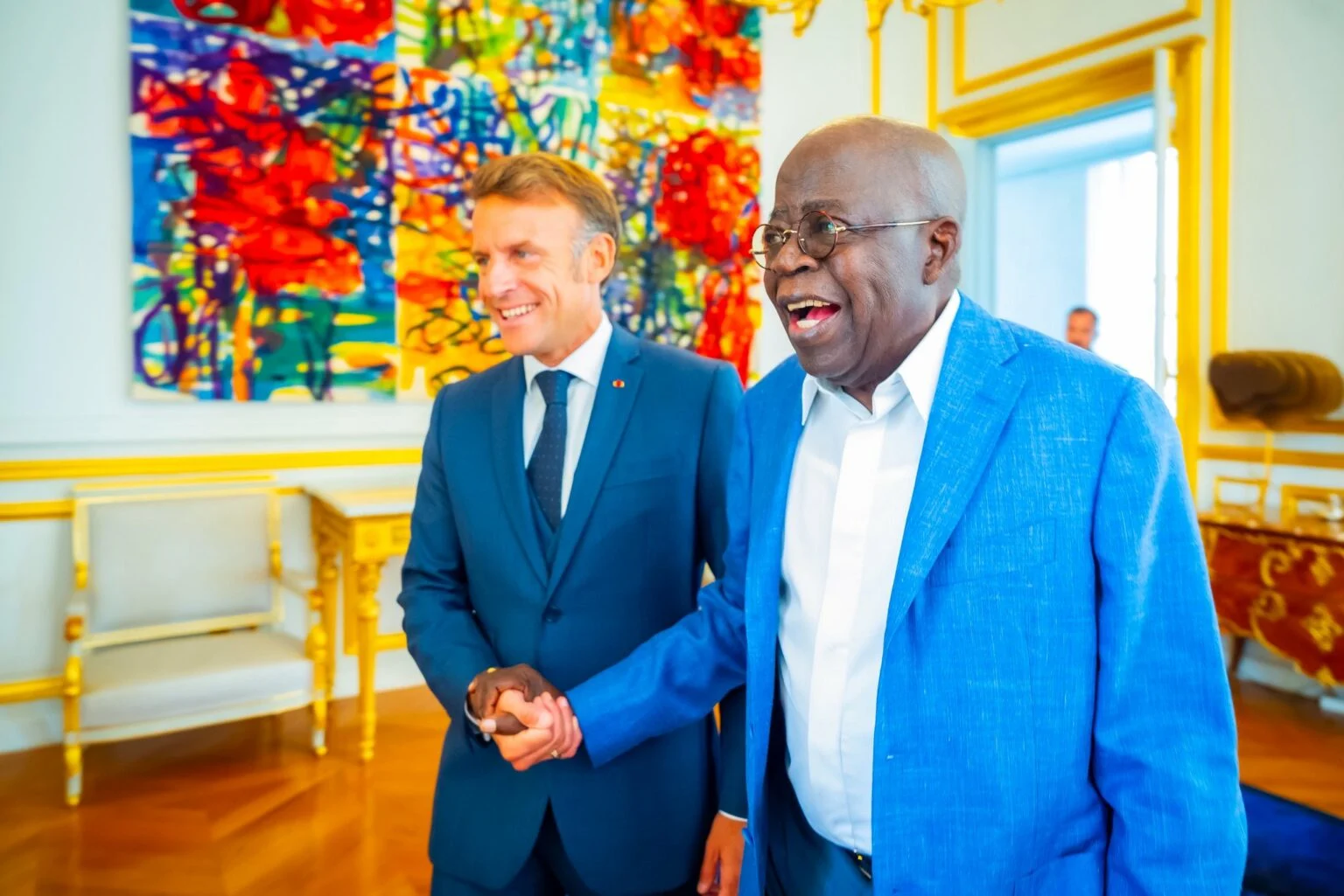Tinubu in a warm exchange with Macron at the Elysee Palace in Paris. 2 1536x1025 1